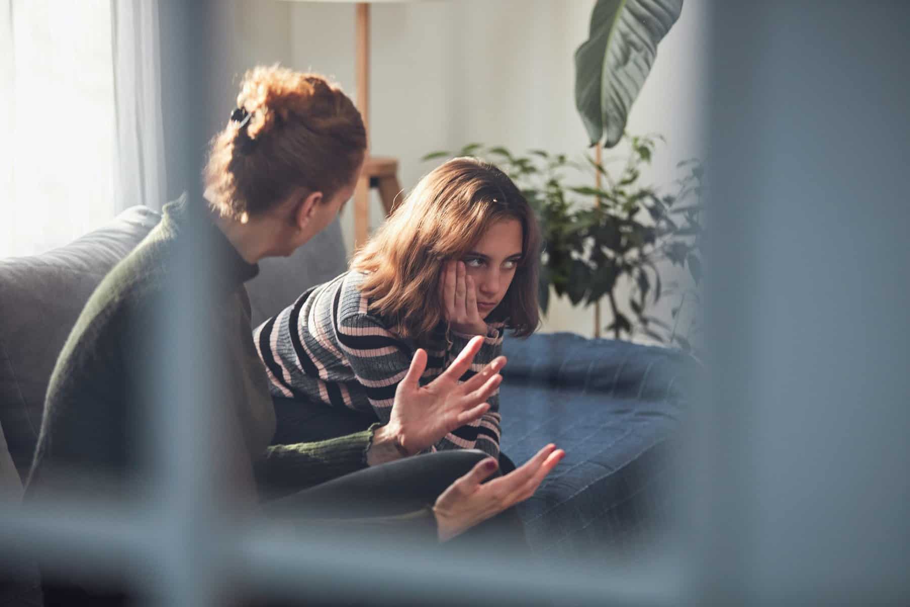 Mother and daughter having serious conversation